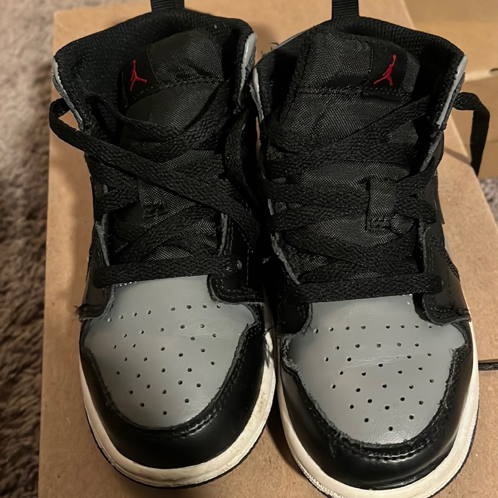 Gray and black toddlers sneakers